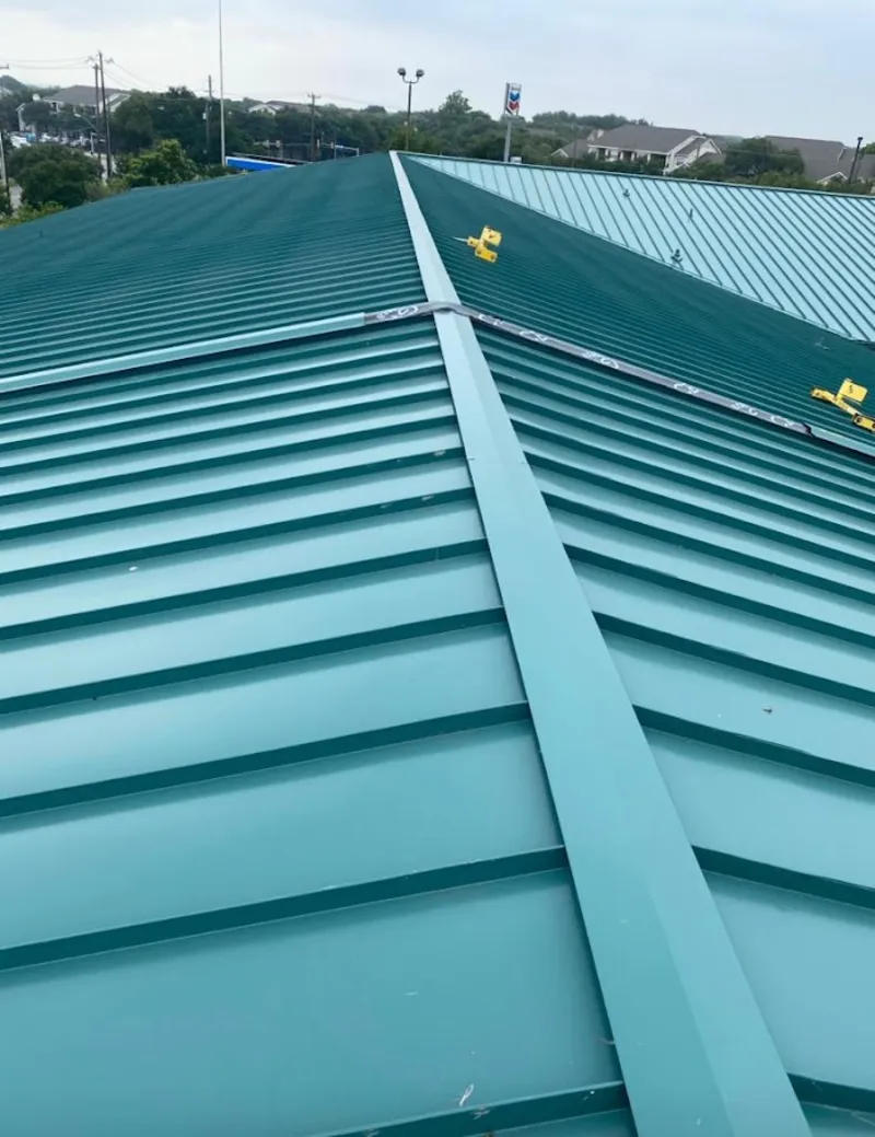 Green commercial metal roof ridge and valley for Metal Roof Repair in Vero Beach South