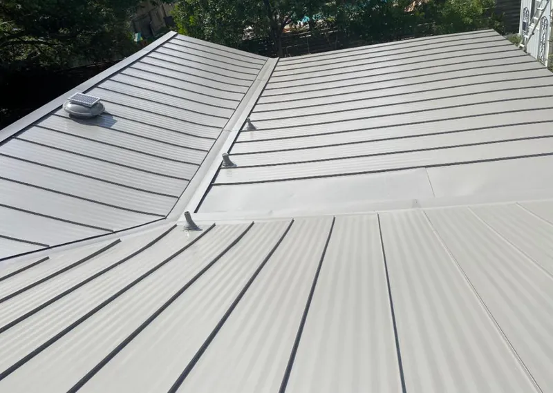 Solar attic fan installed on a metal roof for Roof Ventilation in Vero Beach South